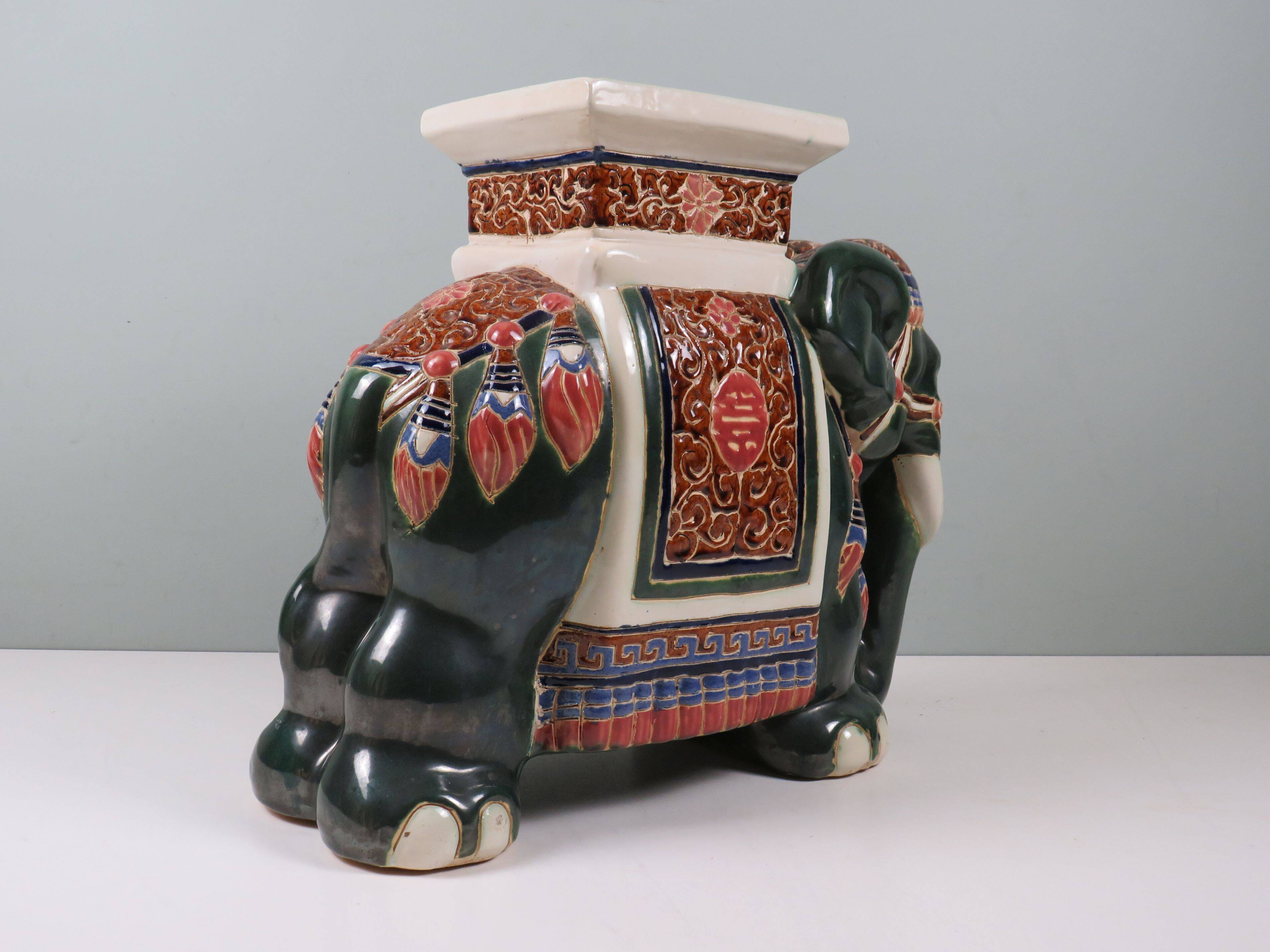 Large vintage ceramic elephant in glazed finish, stool or side table.
