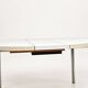 Vintage round extendable dining table, white laminate on chrome legs.