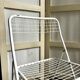 2 white metal "Ted Ned" folding chairs by Niels Gammelgaard for IKEA, 1980s