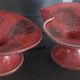 Pair of speckled red and black glazed stoneware ceramics – Signature