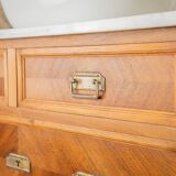 Antique washbasin cabinet from 1928 in wood and marble with a lighted mirror.