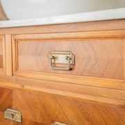 Antique washbasin cabinet from 1928 in wood and marble with illuminating mirror.