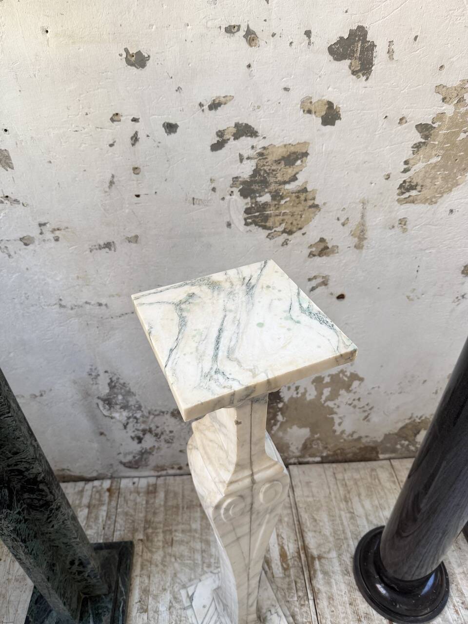 Set of 4 marble columns or pedestals.