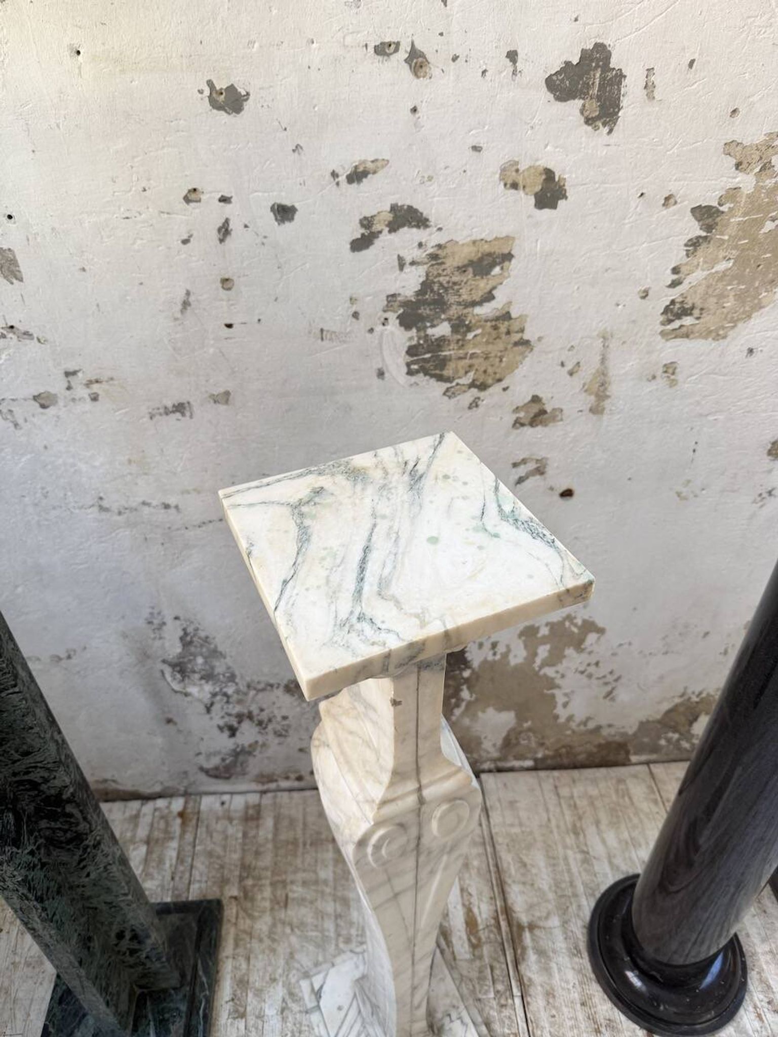 Set of 4 marble columns or pedestals.