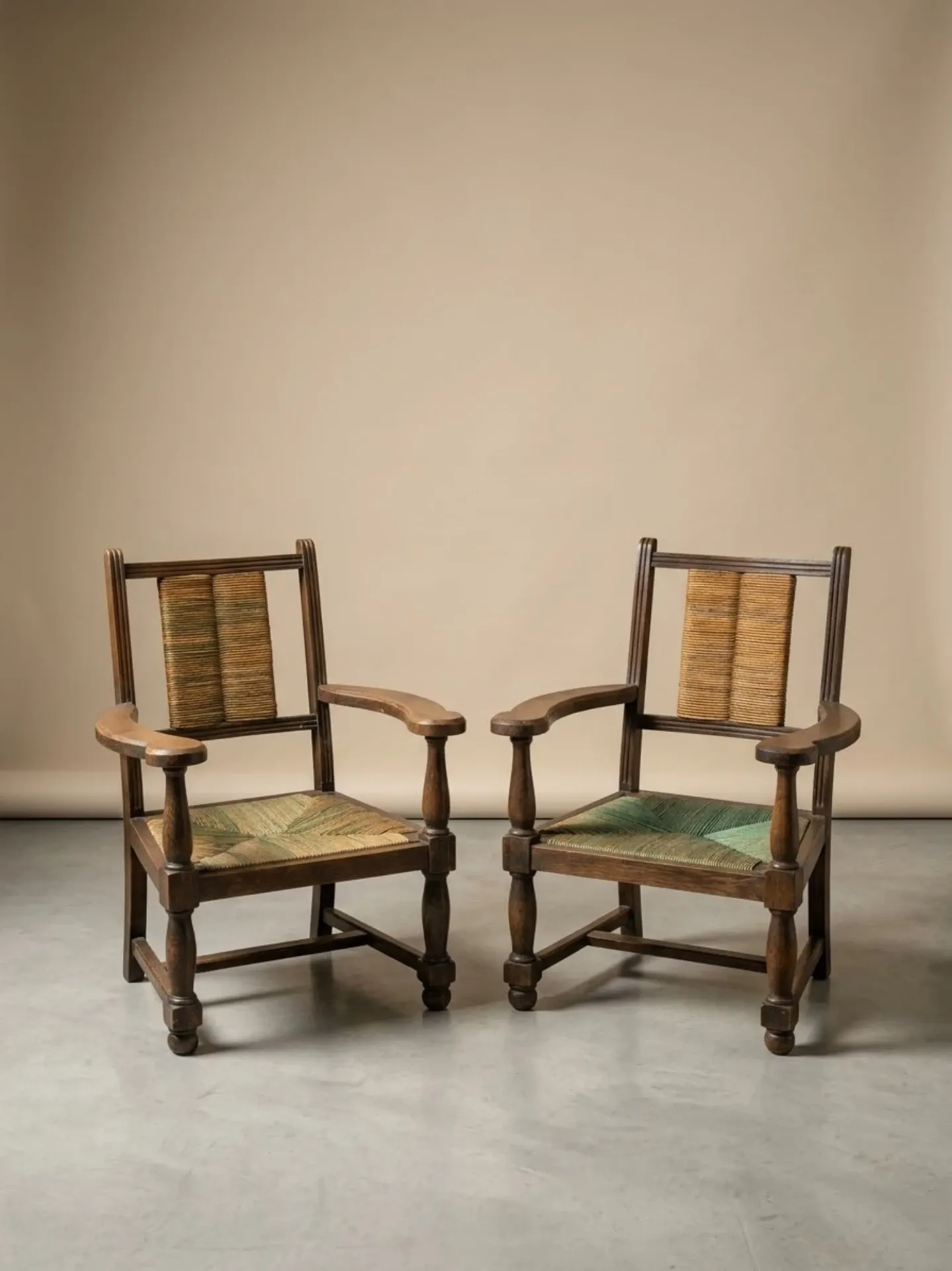 Brutalist pair of rustic turned wooden armchairs from the 1950s.