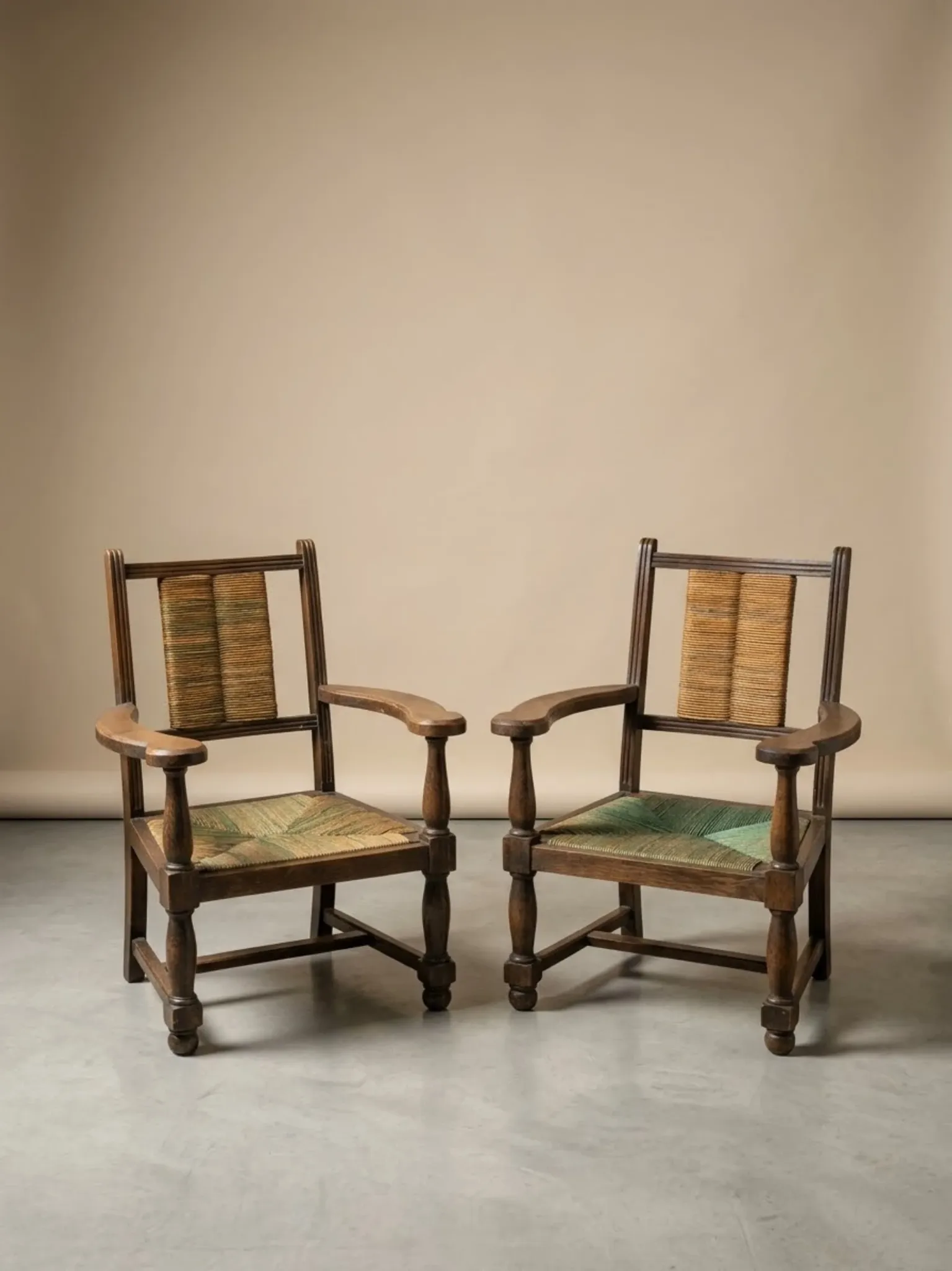 Brutalist pair of rustic turned wooden armchairs from the 1950s.