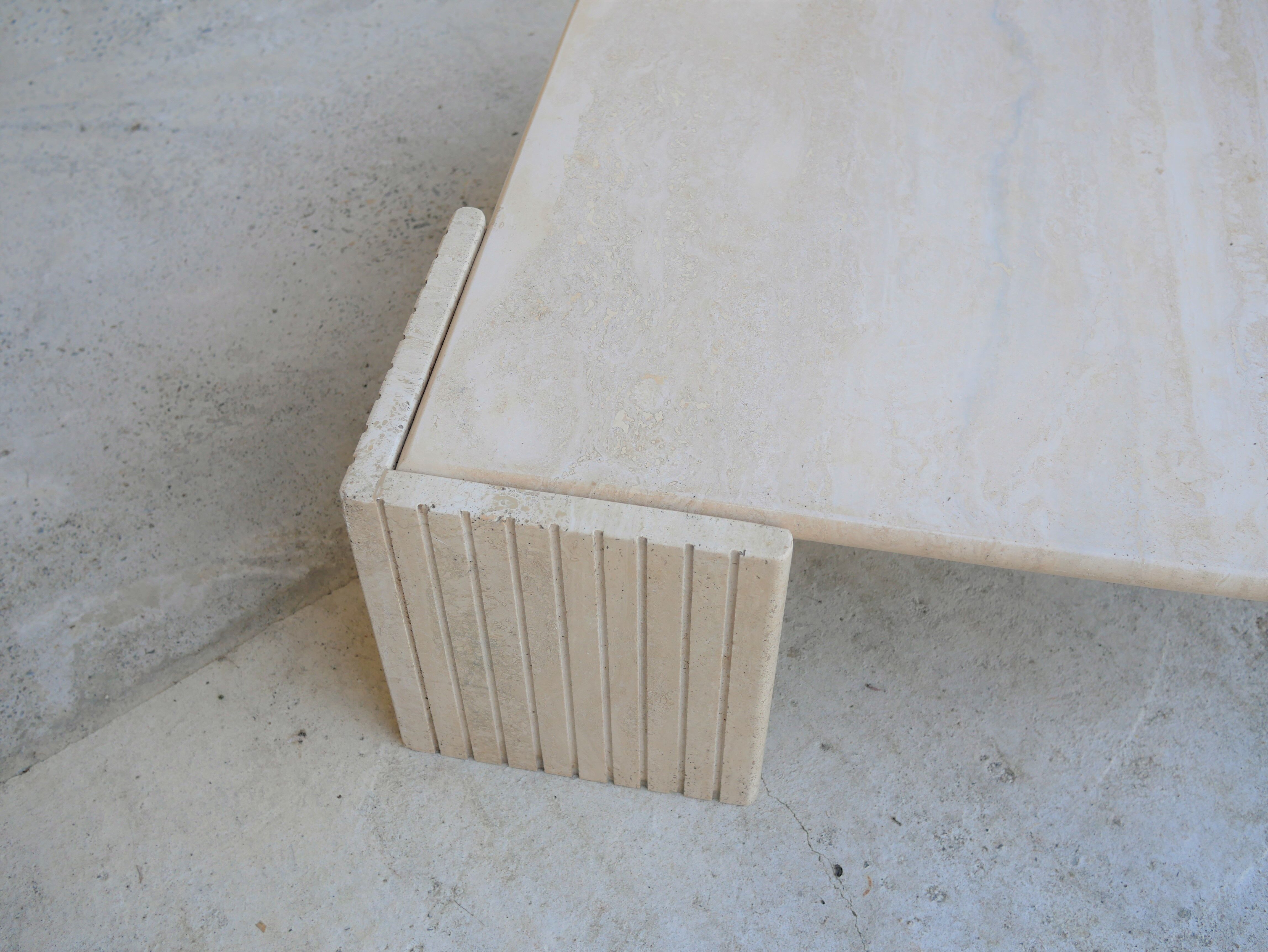 Coffee table in travertine by Roche Bobois editions