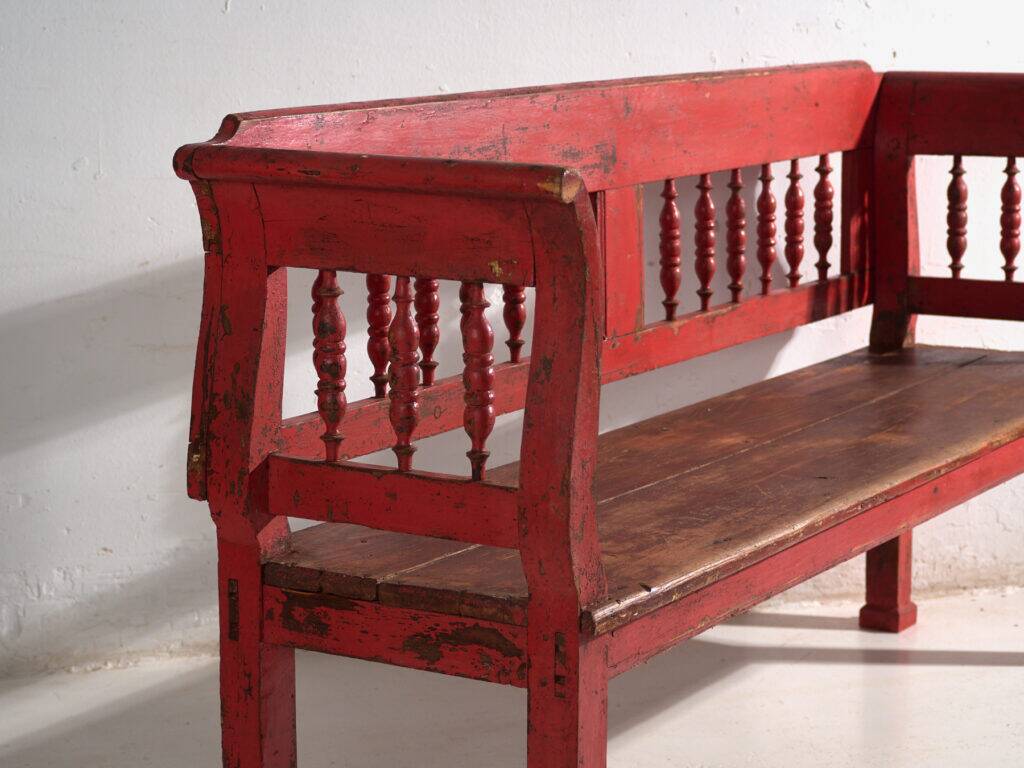 Old red-painted pine bench with turned backrest – Central Europe, circa 1900