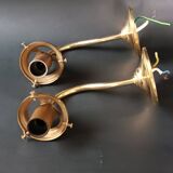 Brass and frosted glass wall lights
