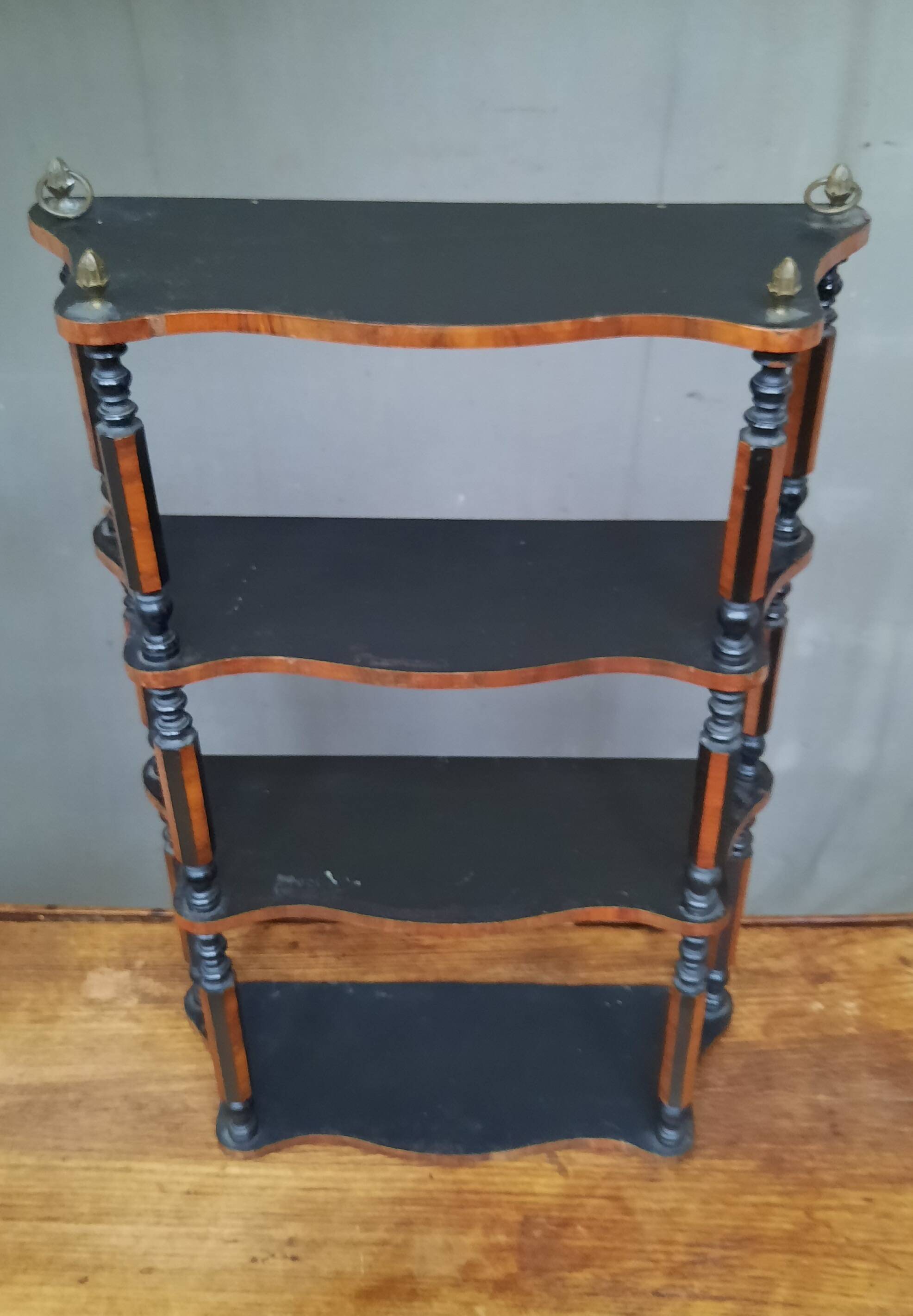 Blackened wooden wall shelf