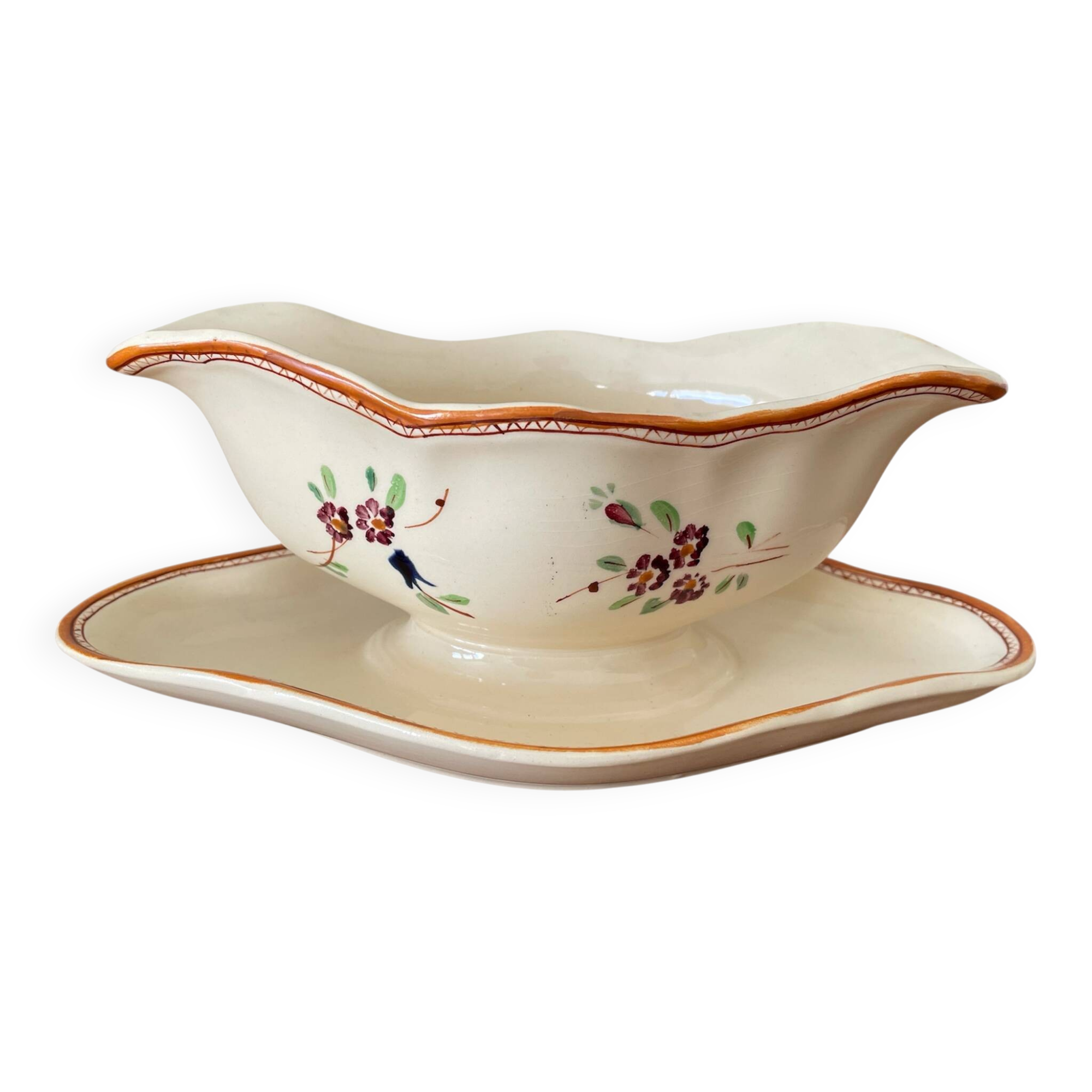 Large antique sauceboat in Longchamp earthenware.