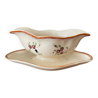 Large antique sauceboat in Longchamp earthenware.