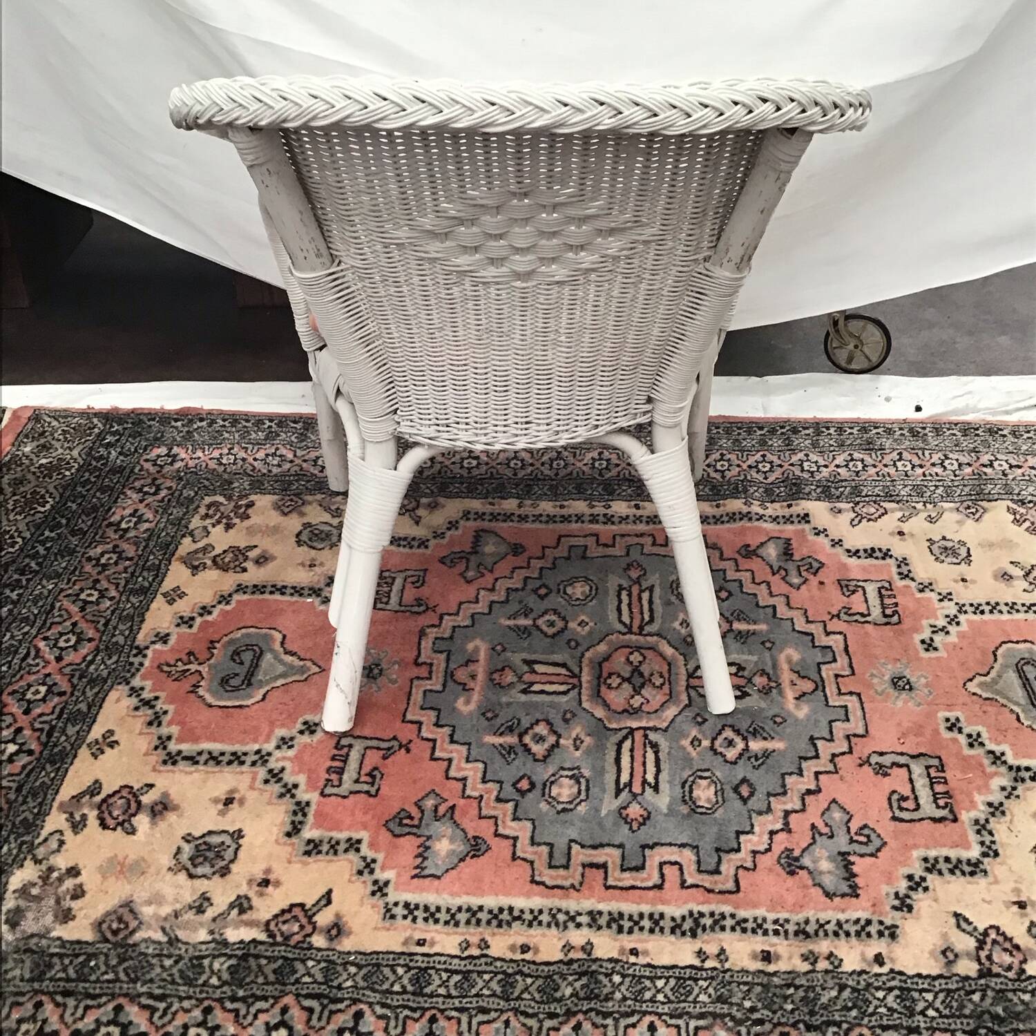 White rattan armchair with pretty vintage