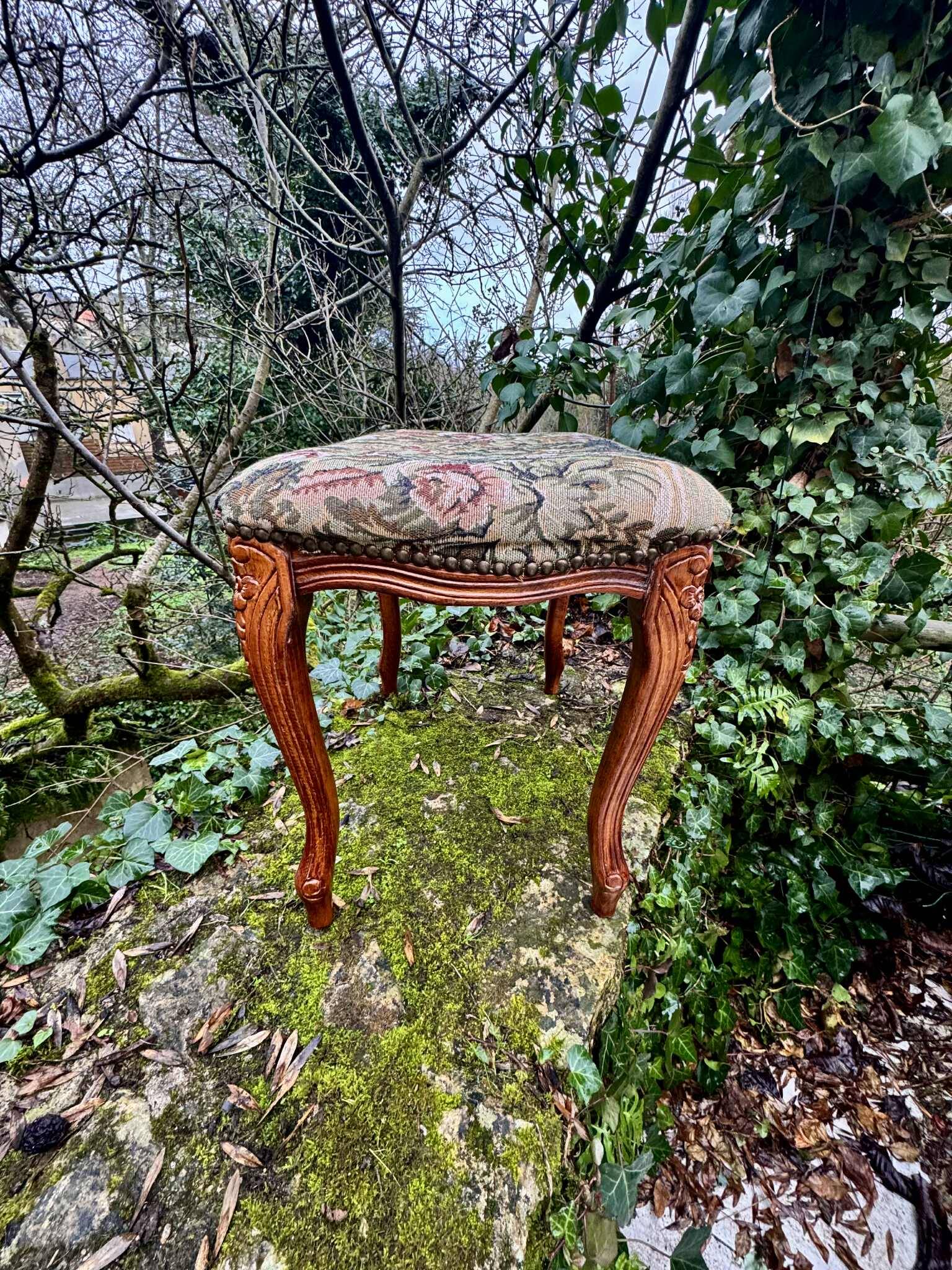 Large antique footrest in the Louis XV style.