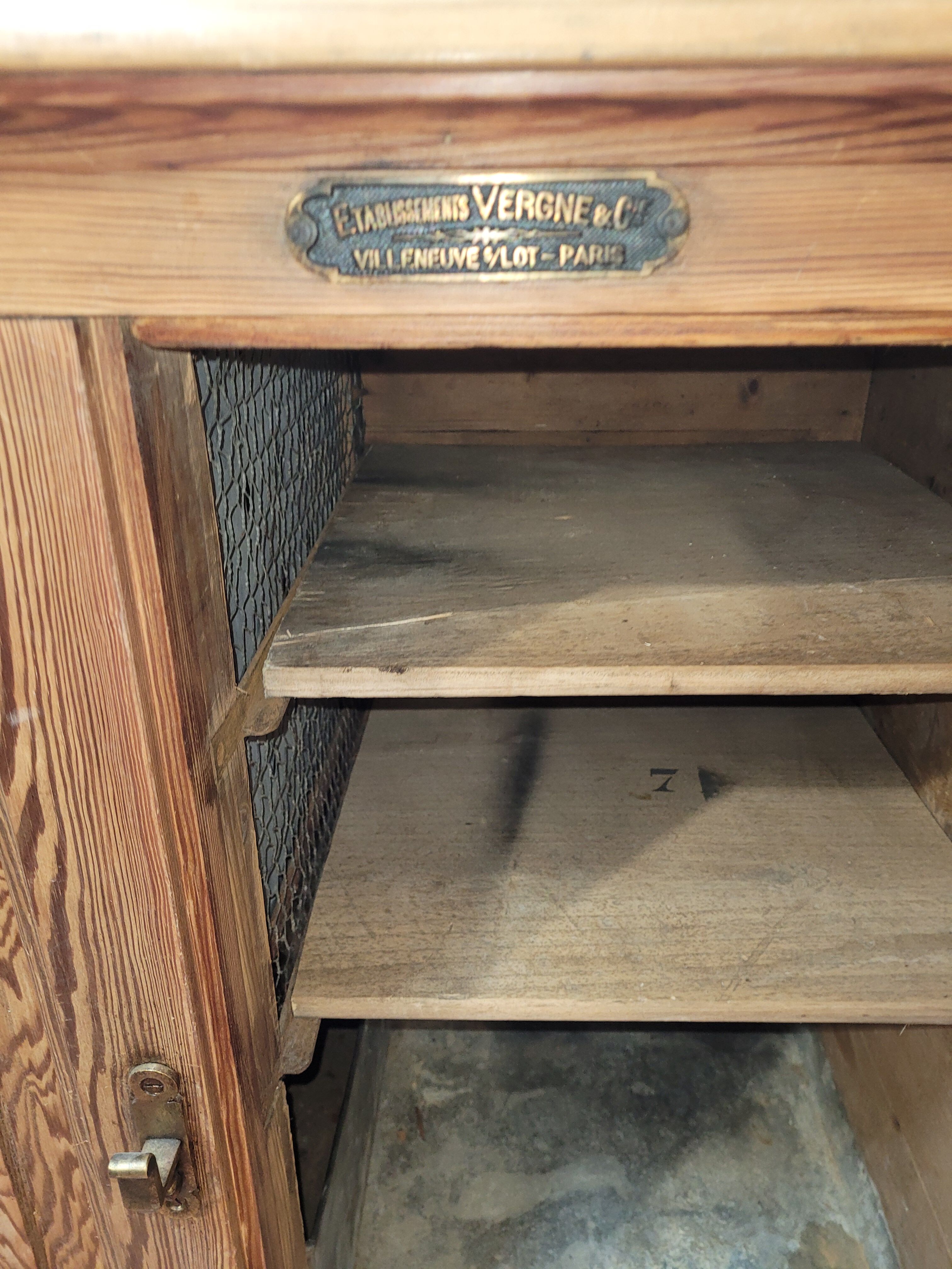 Antique cooler with a door