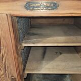 Antique cooler with a door