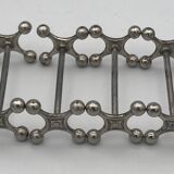 Set of 6 old table knife resistors in the shape of crossbars in silver metal