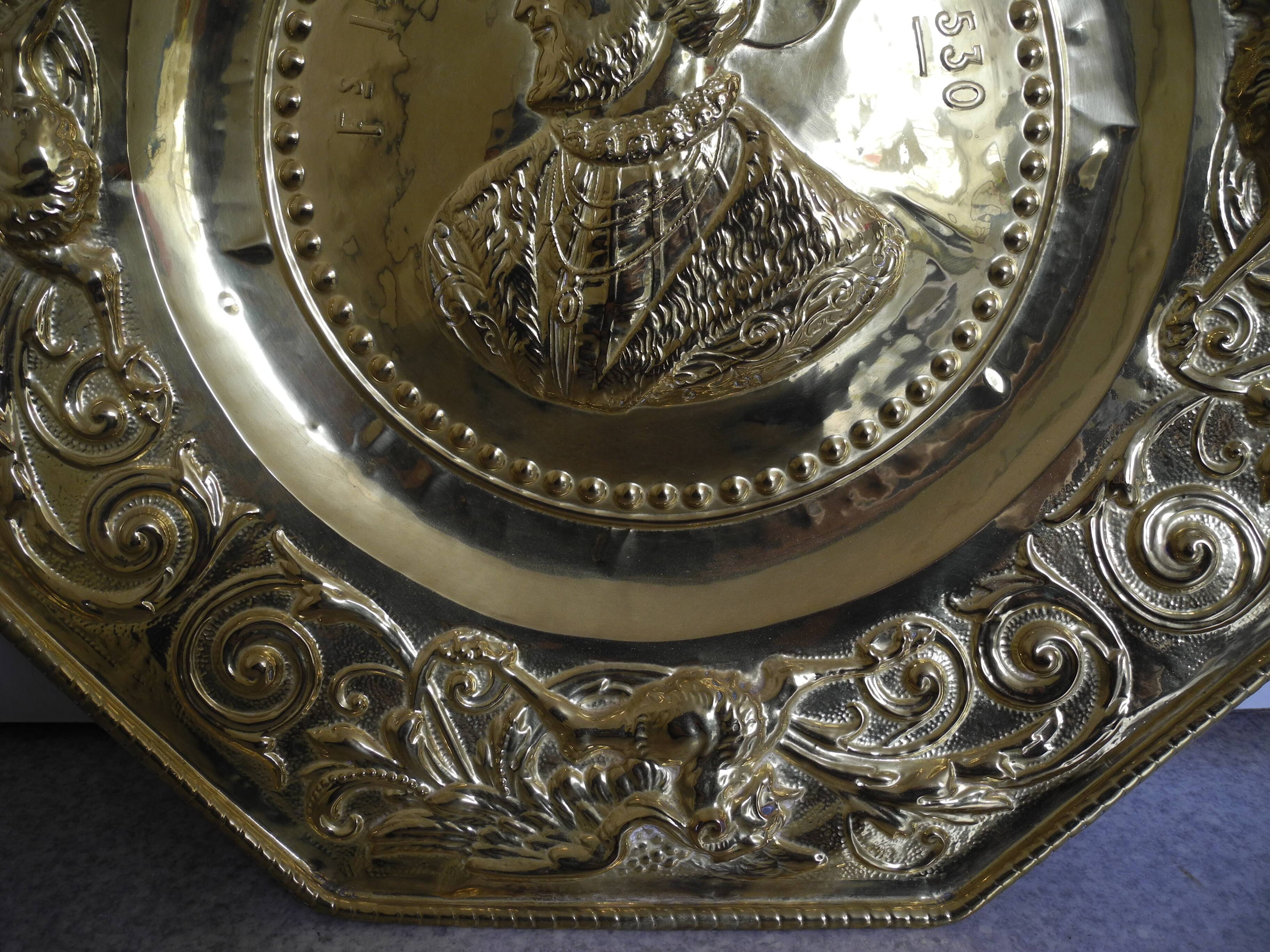 Offering dish in embossed brass by François I