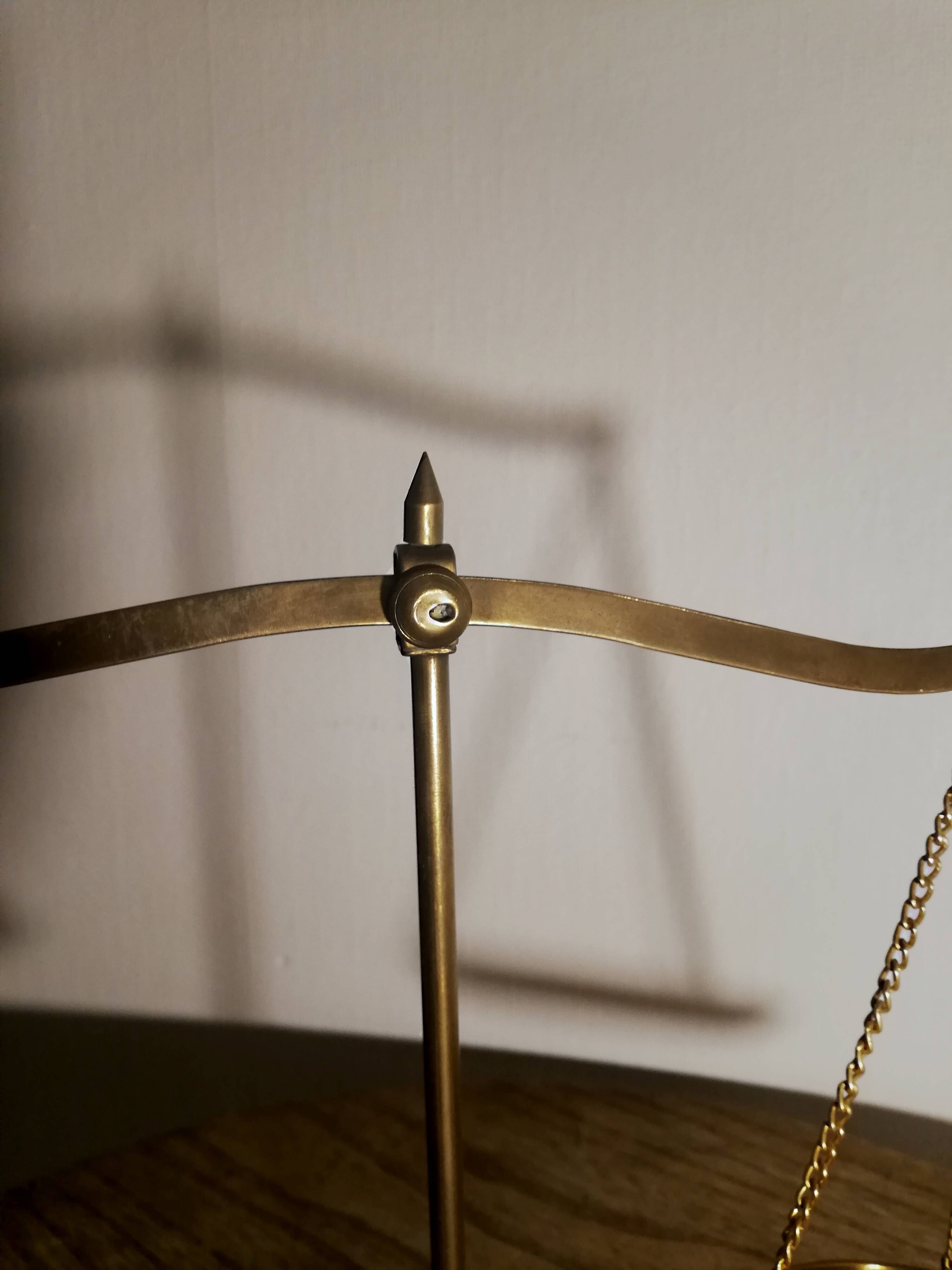 Gold metal trebuchet scale