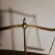 Gold metal trebuchet scale