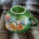 Antique cup and saucer in slipware.