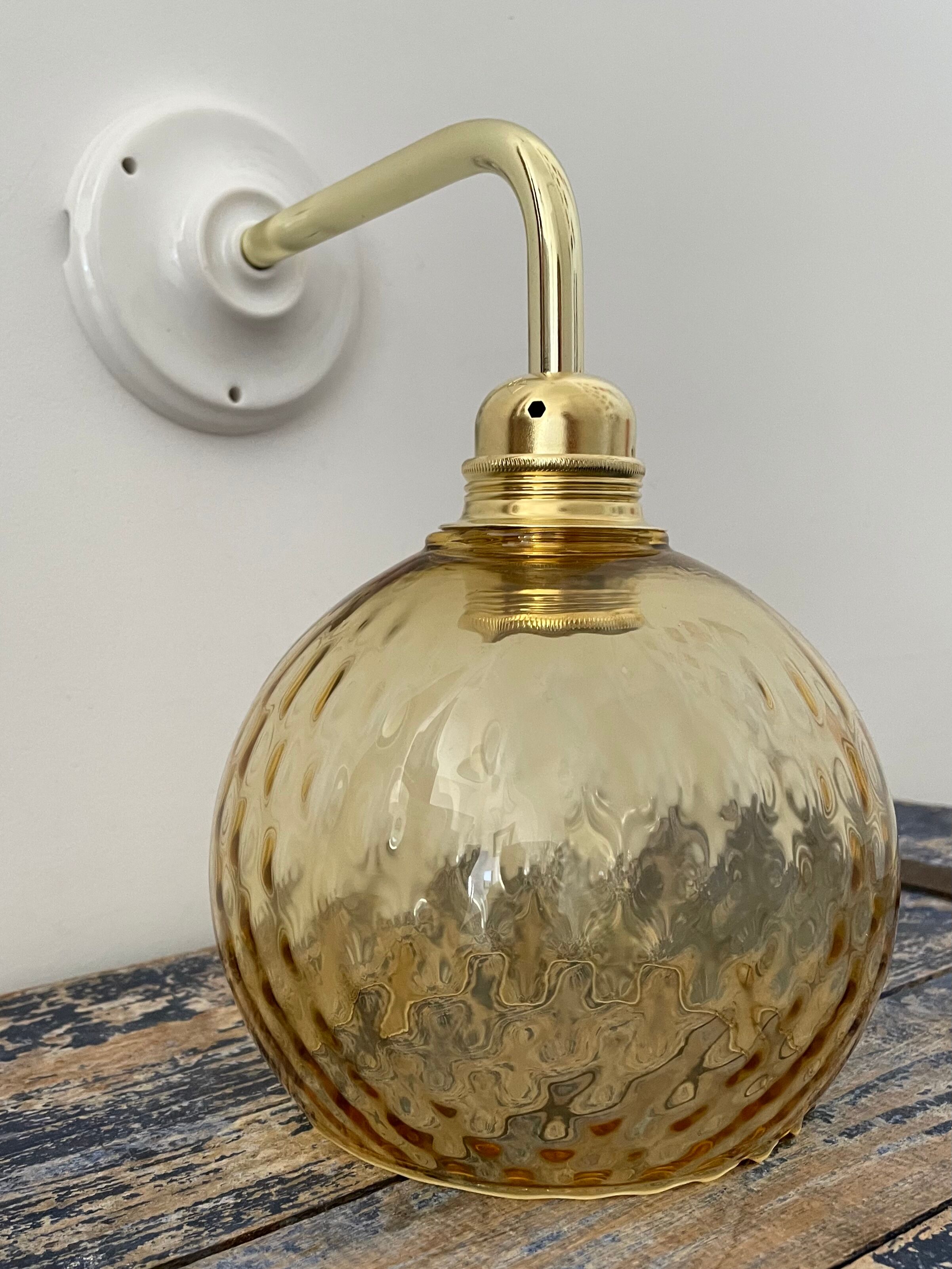New electrified golden globe wall lamp