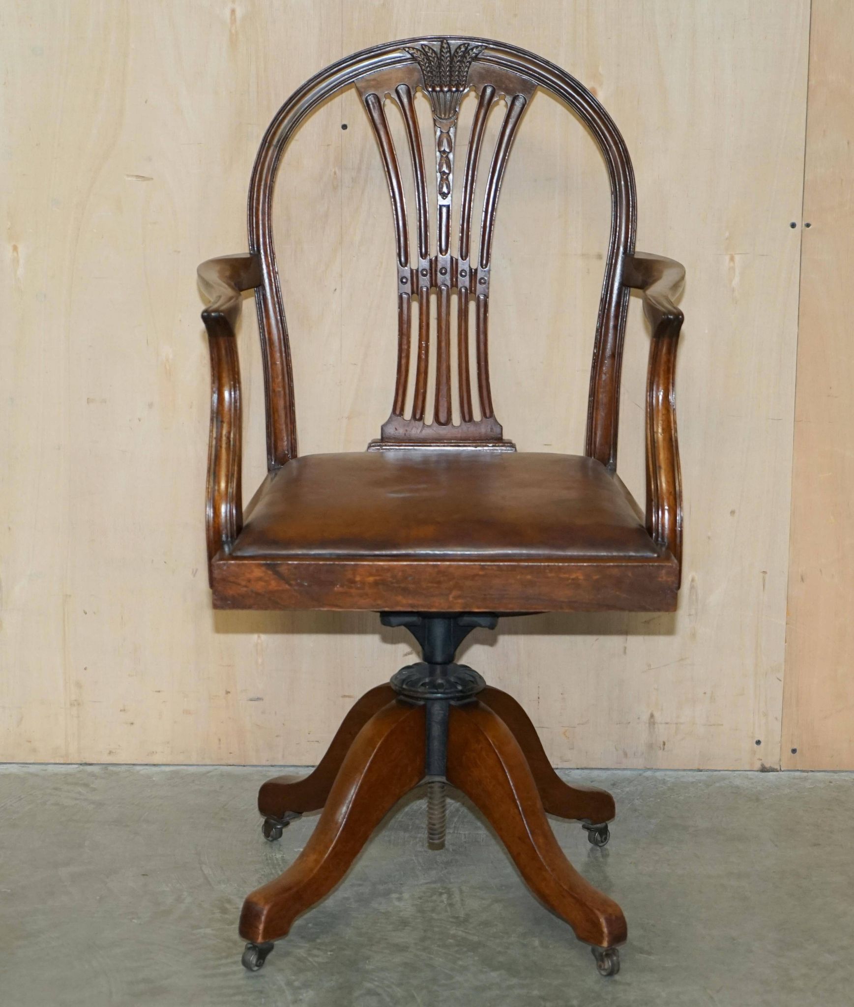 Antique George Hepplewhite captain's chair 1880 leather