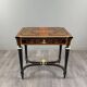 Writing table in Napoléon III style with marquetry and gilded bronzes, 19th century.