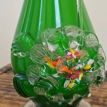 Excentric green blown glass vase with relief flowers Murano
