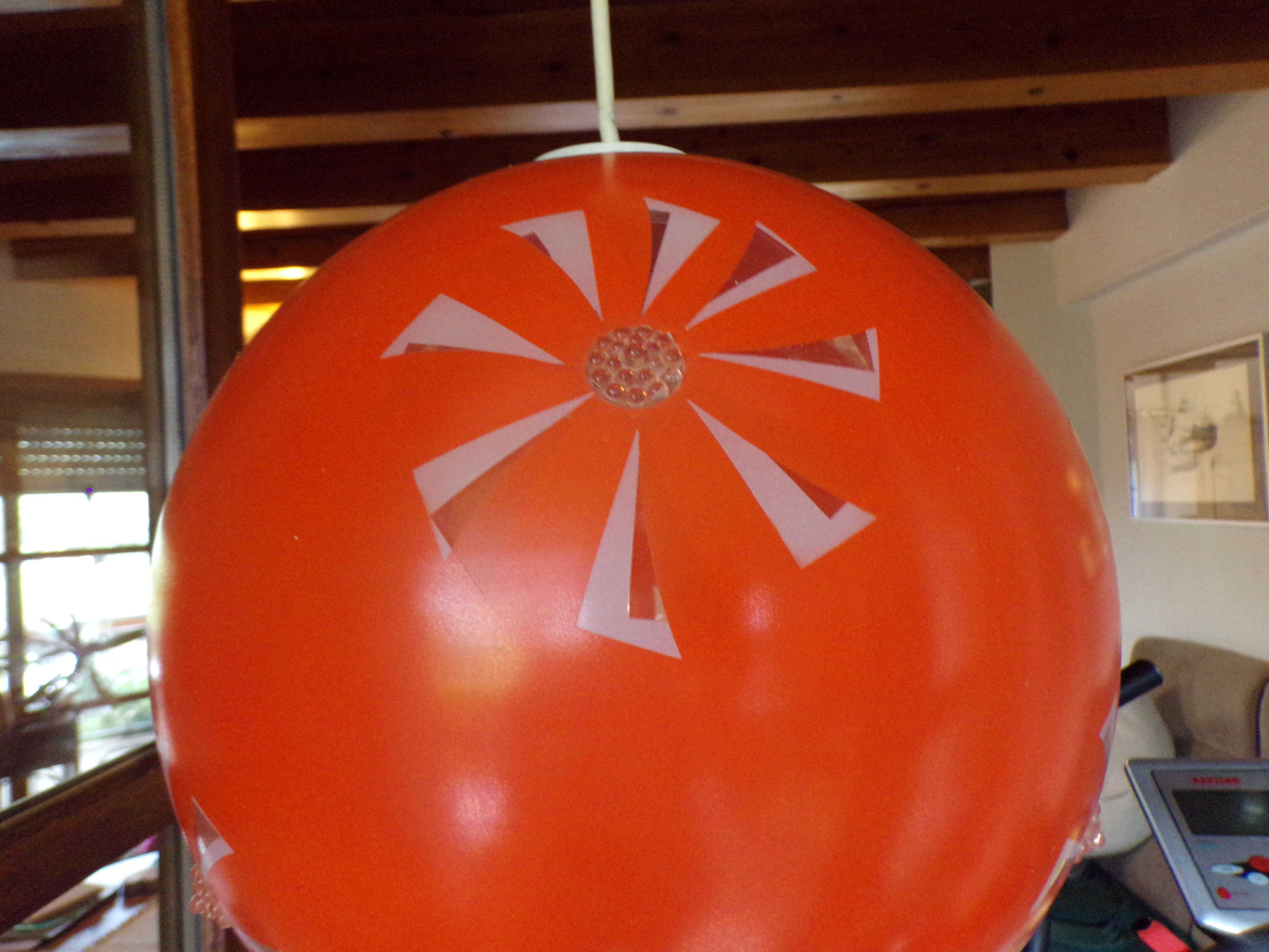 Vintage suspension globe in orange glass