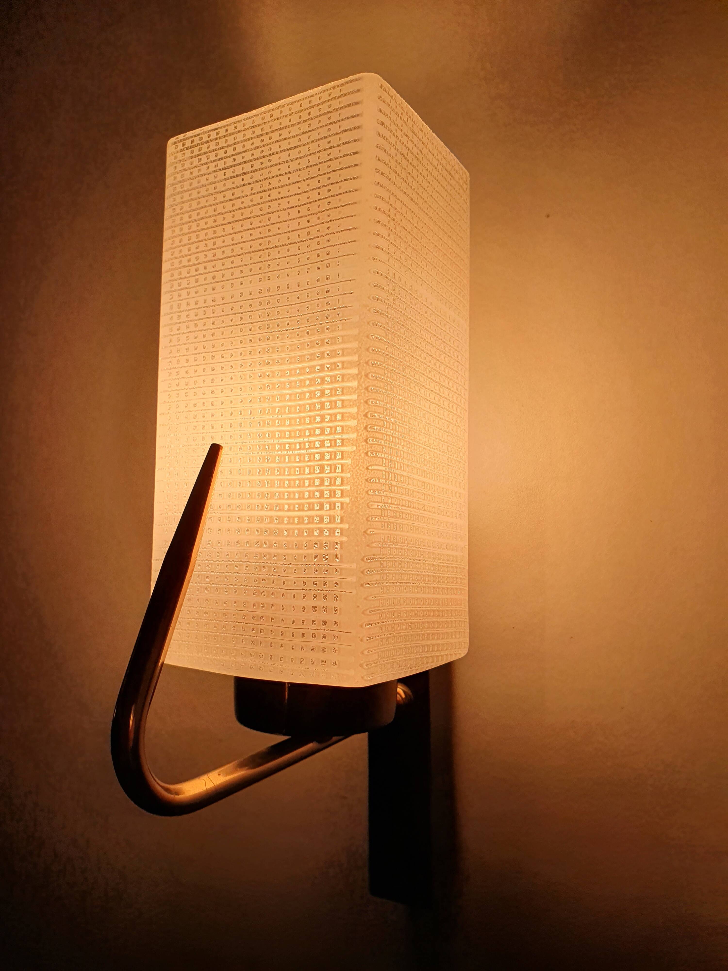 Three antique gold Arlus wall lights from the 50s