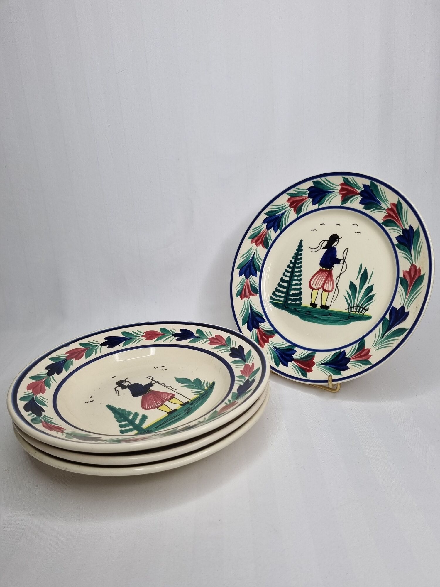 Set of 3 hollow plates and a henriot Quimper flat plate with traditional décor