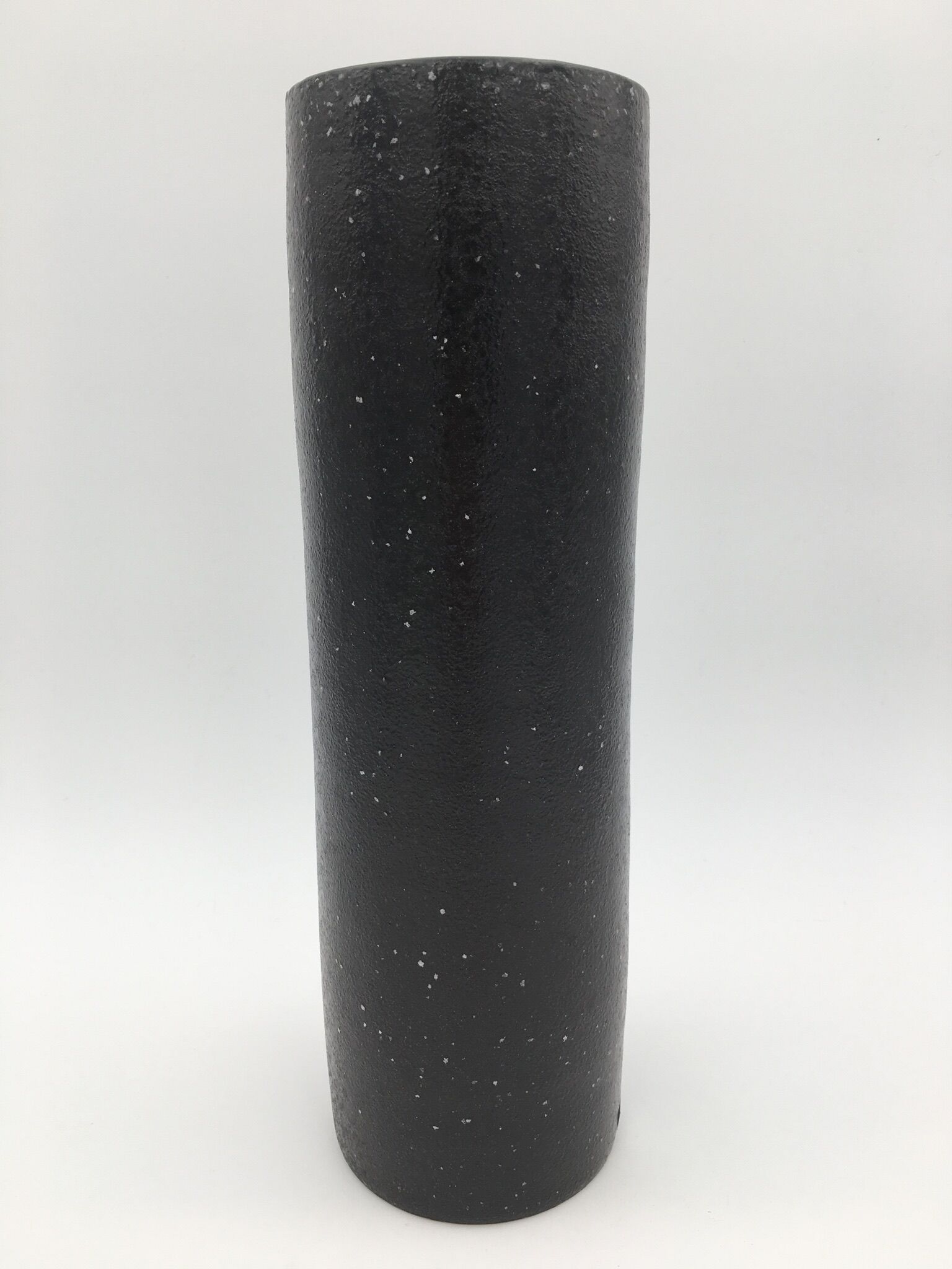 Black ceramic roll vase, decorated with a white circle, design - 20th century
