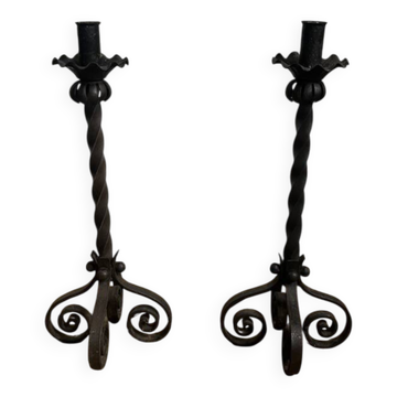 Pair of wrought iron candlesticks