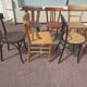 Set of 12 mismatched wooden bistro chairs