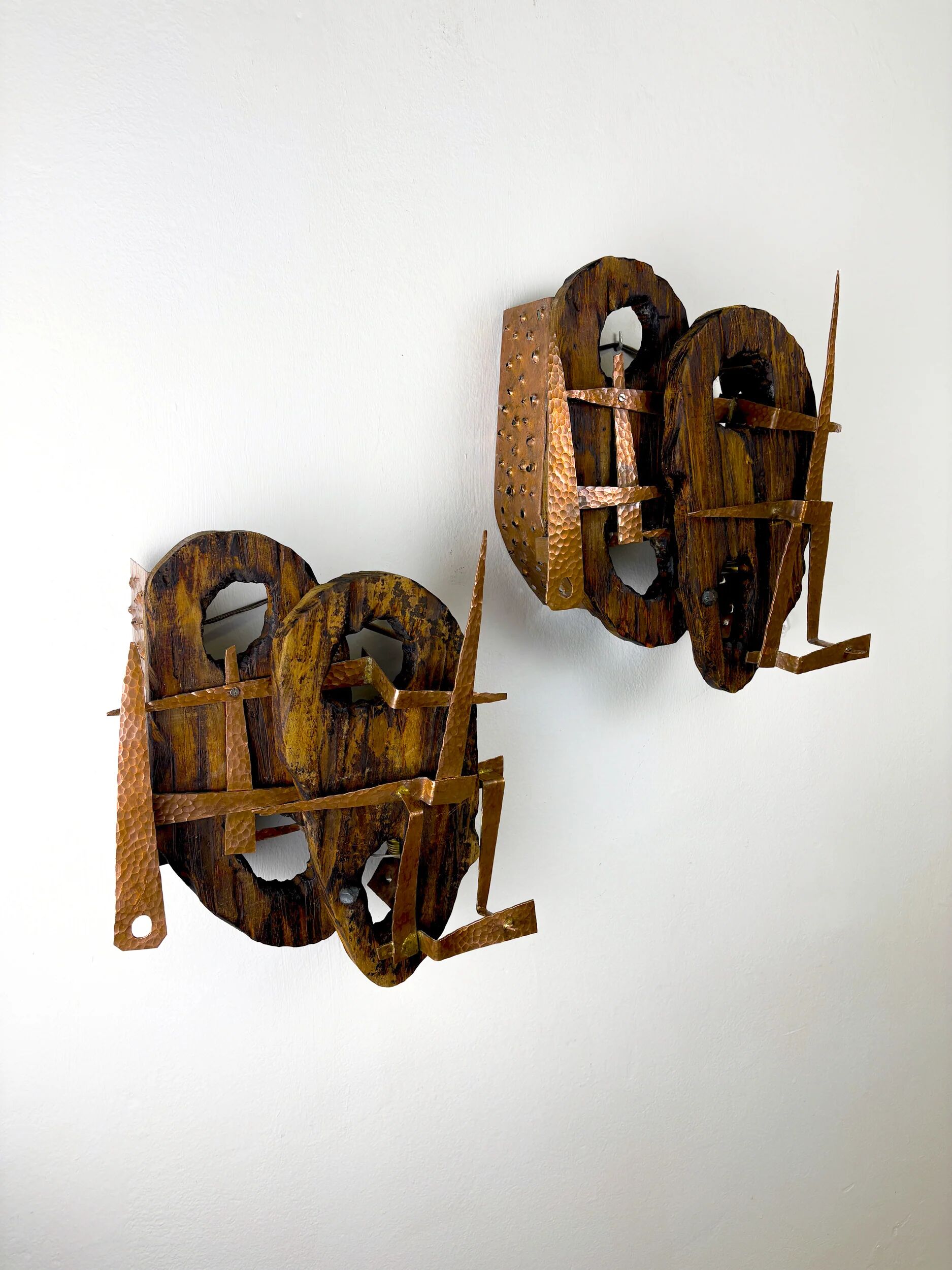 Pair of Brutalist wood & copper wall sconces, Italy, 1970s