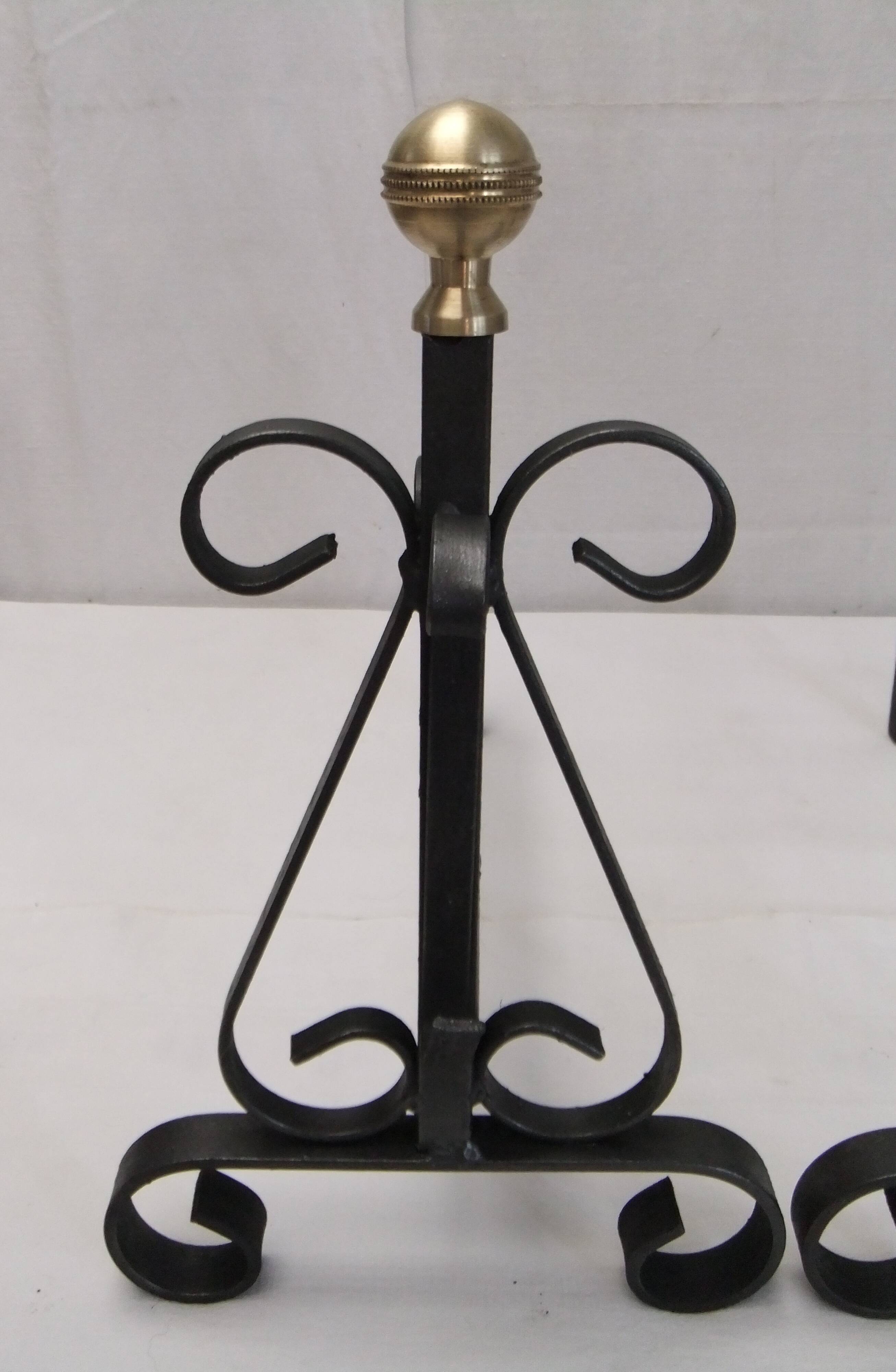 Antique pair of cast iron andirons wrought iron and bronze fireplace accessory
