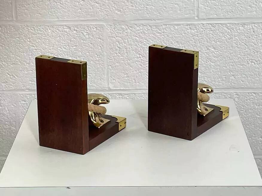 Pair of antique wooden and brass bookends
