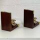 Pair of antique wooden and brass bookends
