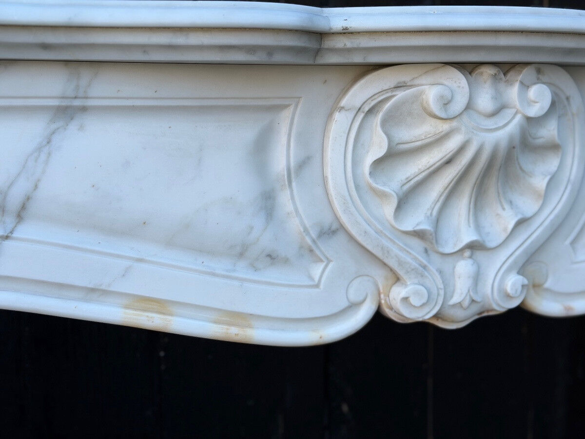 Louis XV style fireplace in Carrara marble, around 1900.