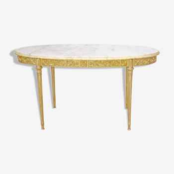 Oval coffee table in marble and brass