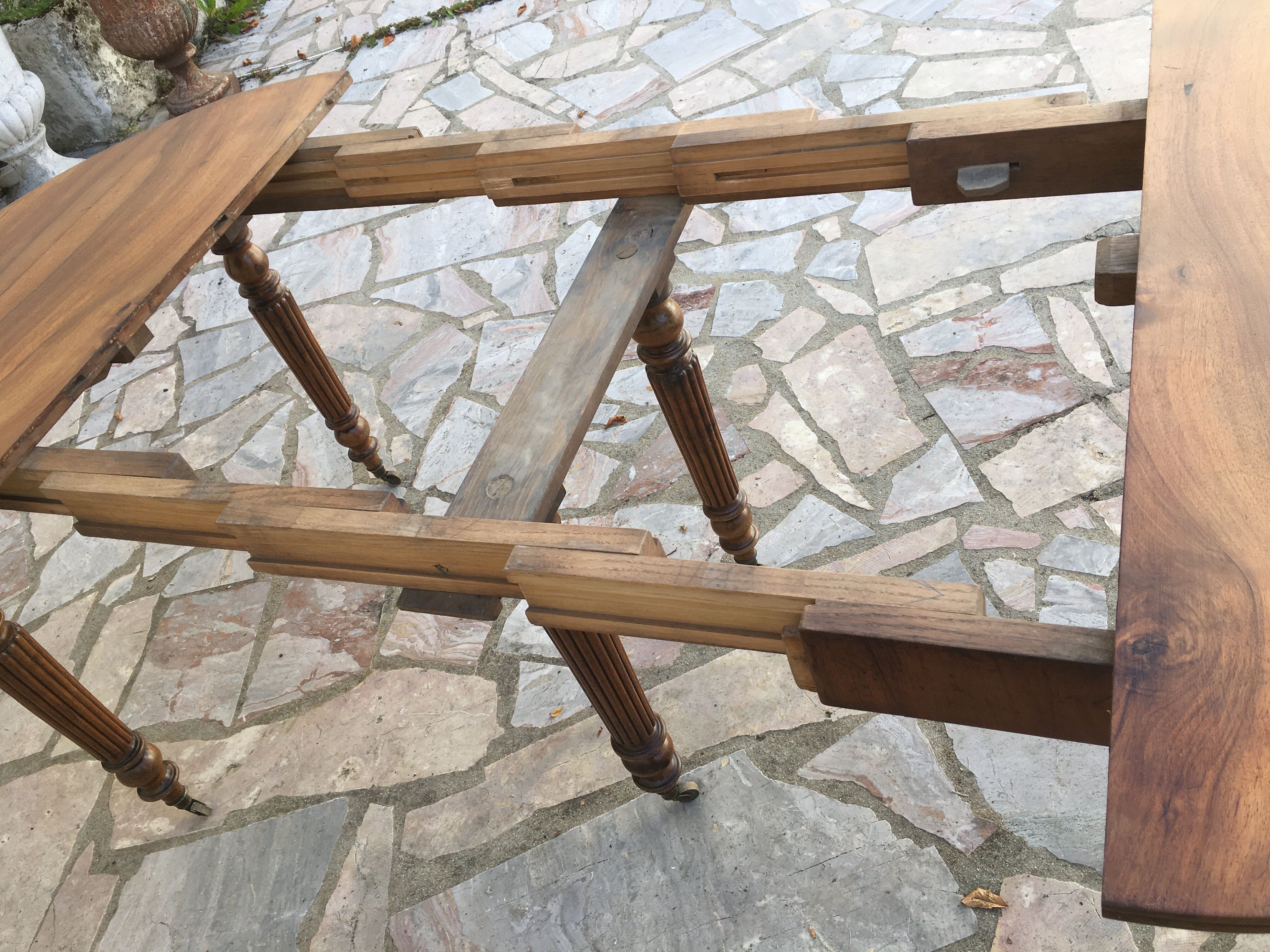 Round table 6 feet 3 solid walnut extensions