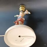 Goebel design Hummel ceramic lamp base with child on an apple tree, 1960s