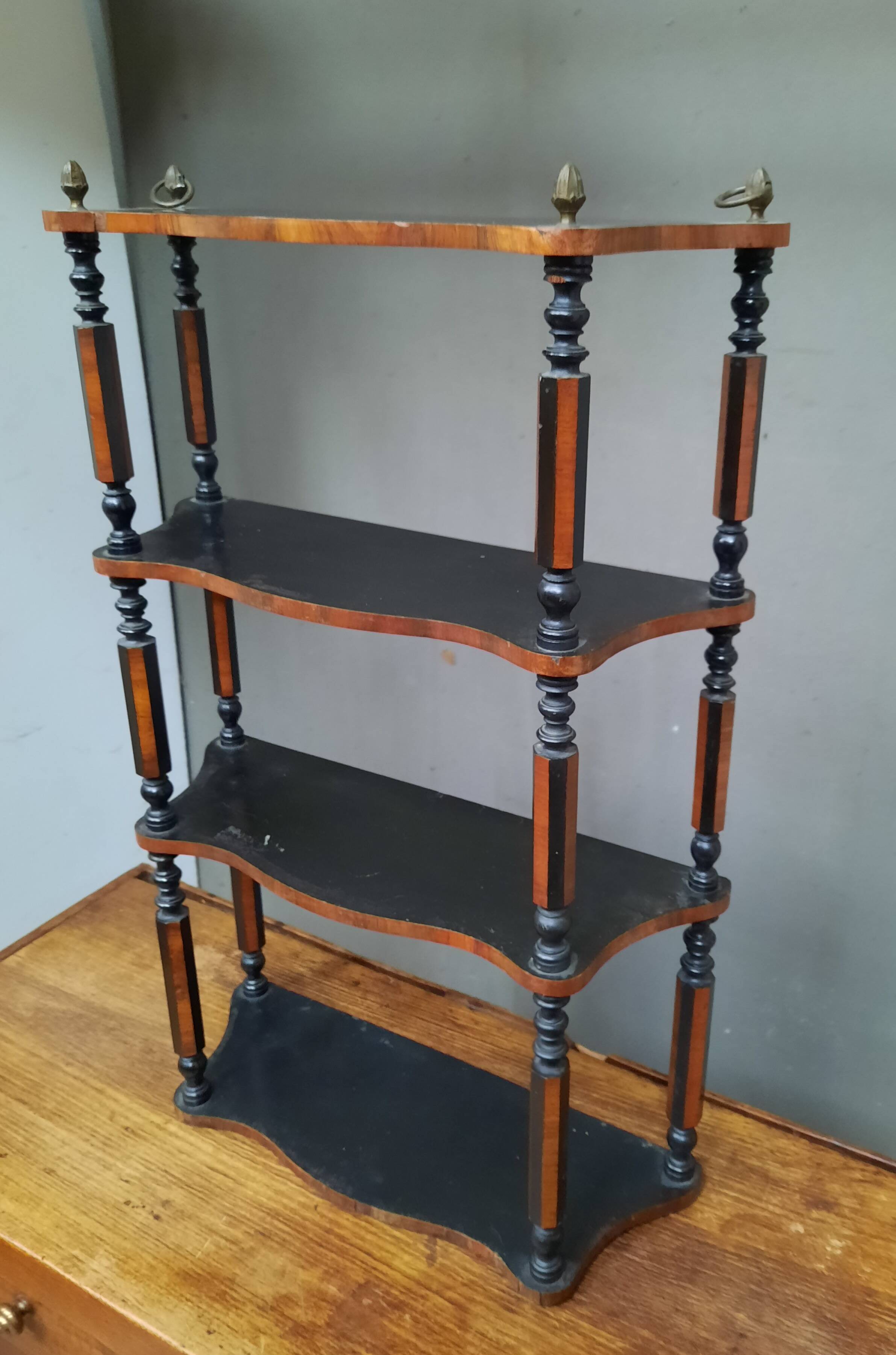 Blackened wooden wall shelf