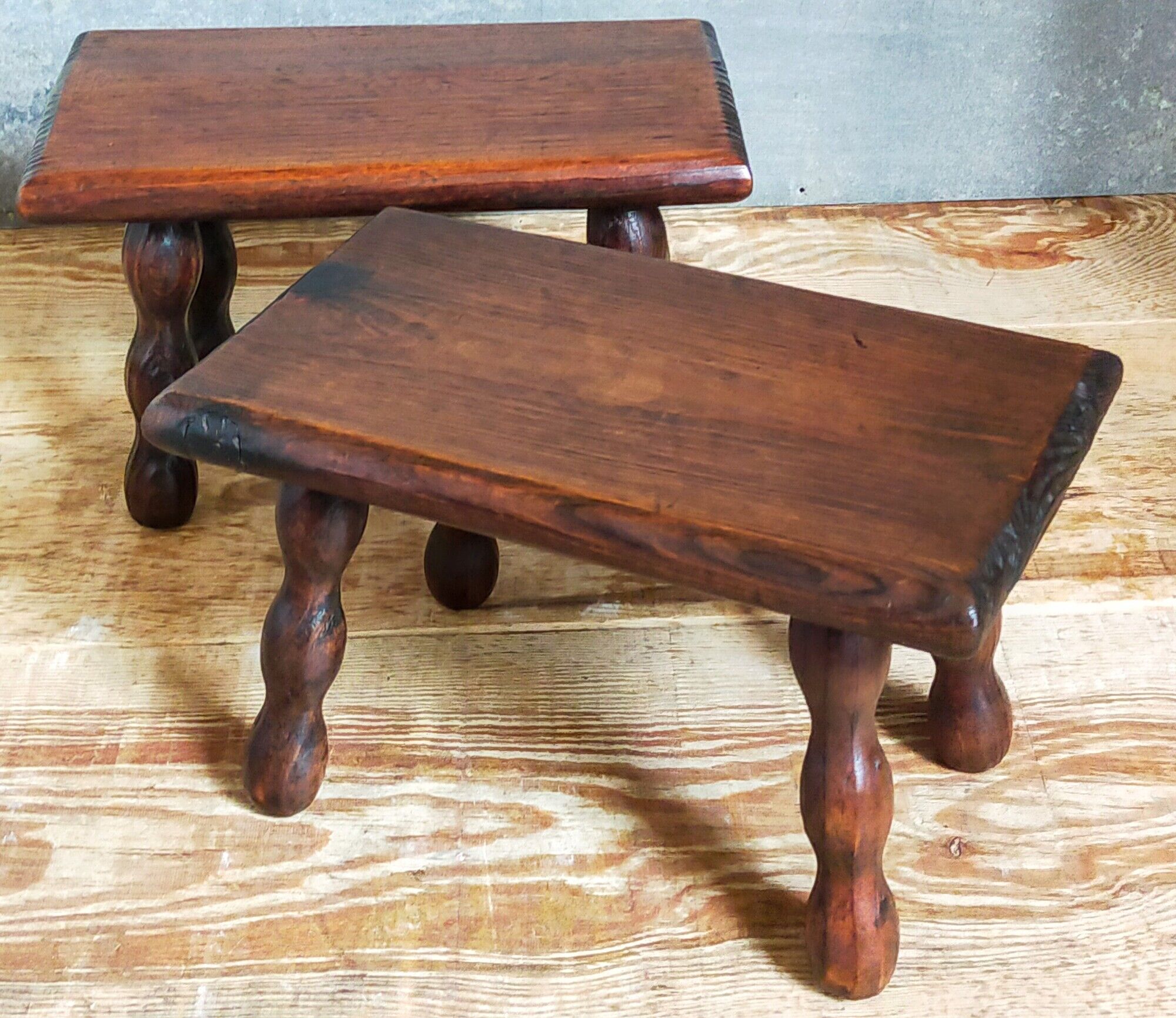 Pair of vintage solid turned wood footstools