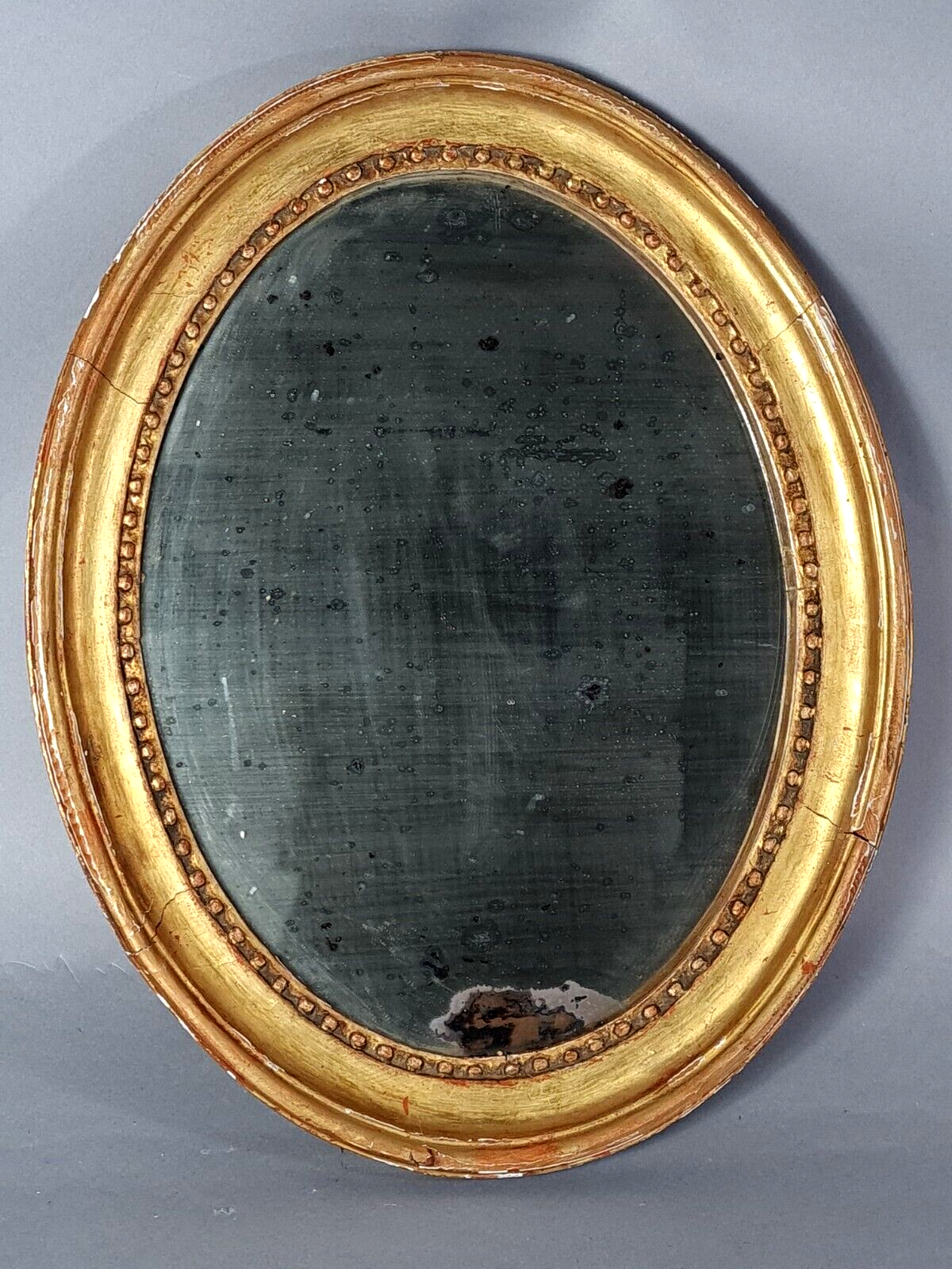 Oval mirror carved wood frame beaded gilded circa 1800 44x35cm SB