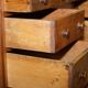 Antique Victorian oak kneehole desk with 18 double-sided drawers.