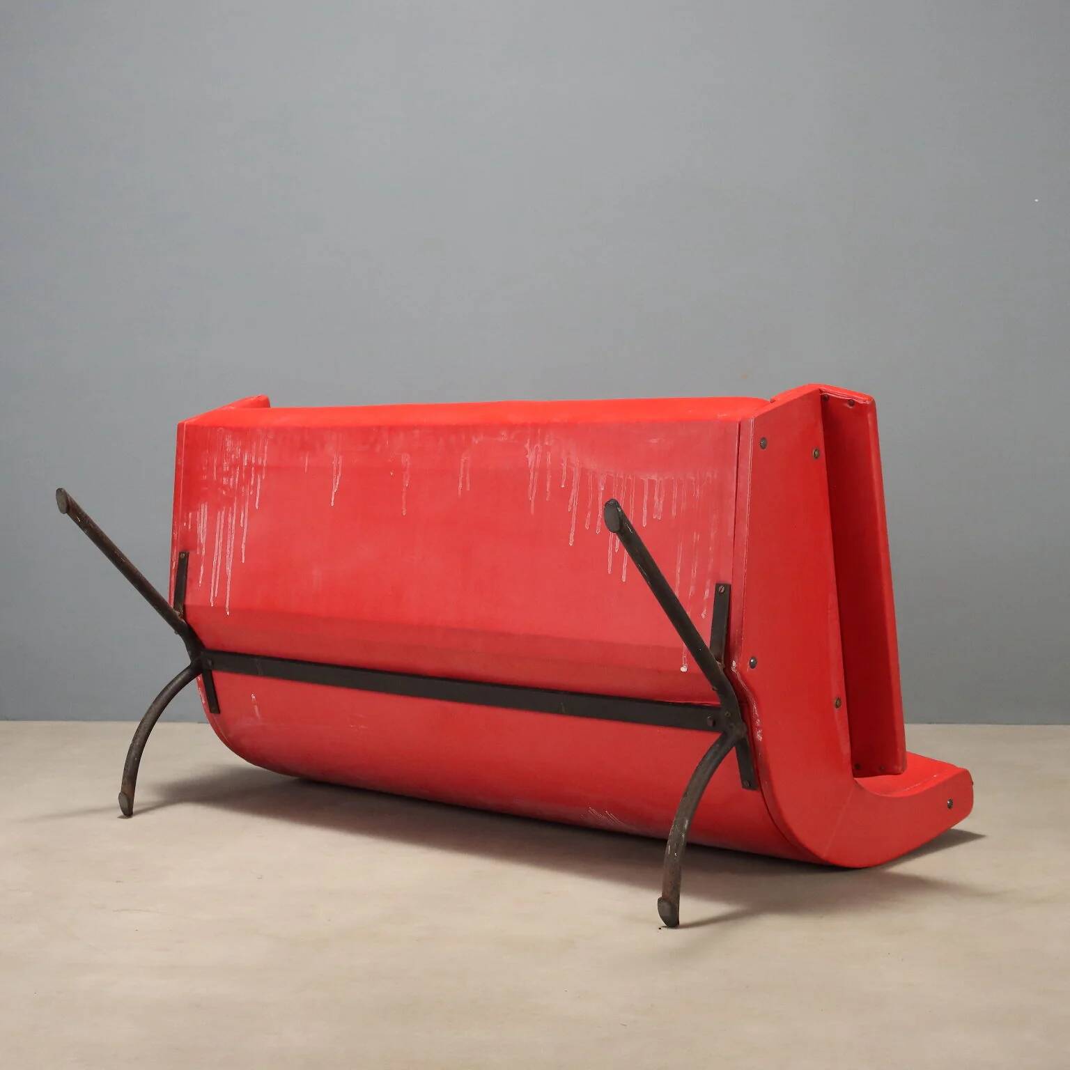 Vintage red faux leather sofa from the 1960s.