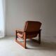 Vintage lounge chair in teak and leather from the 1960s.