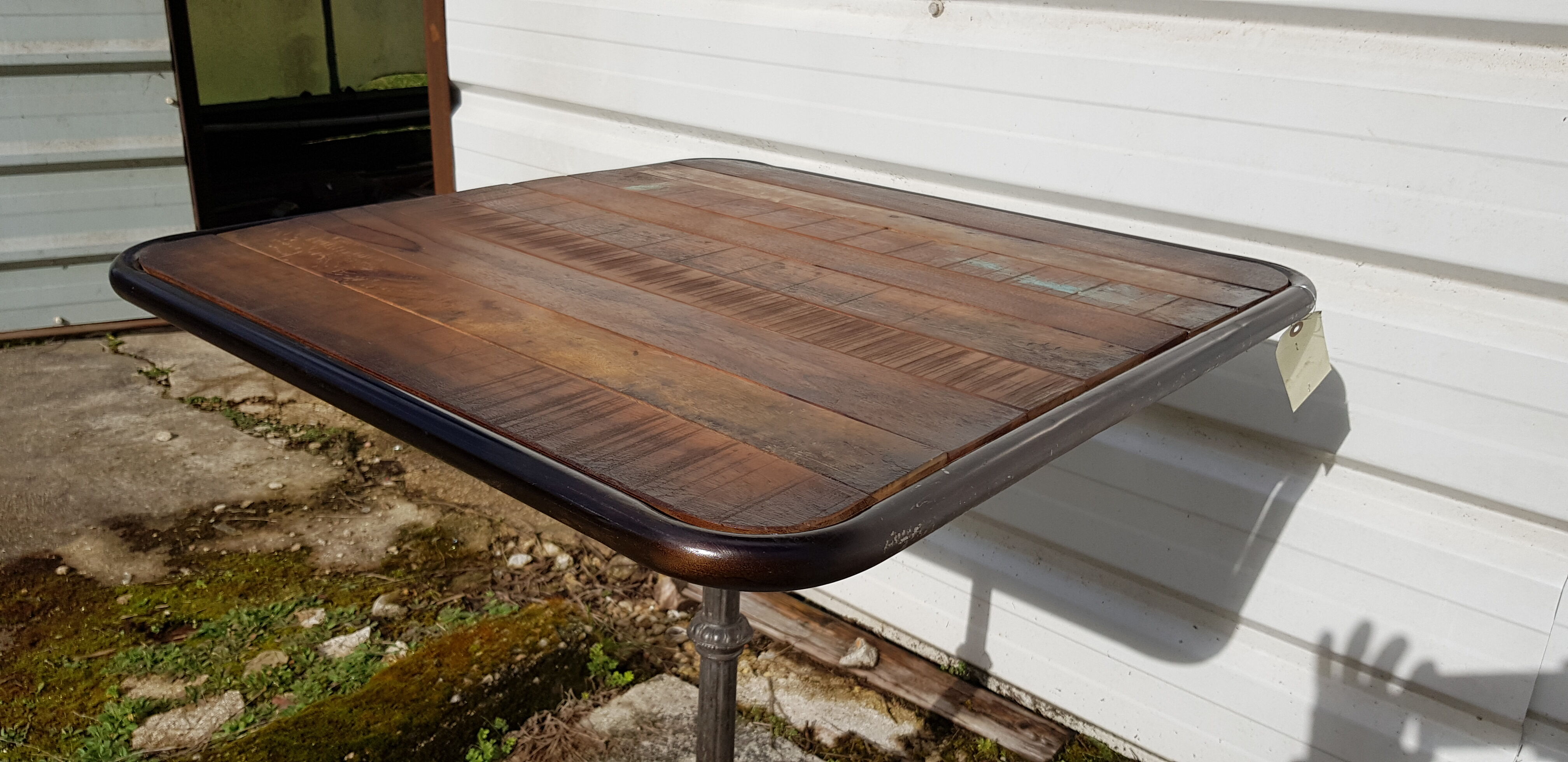 Wooden tray bistro table with old cast iron base